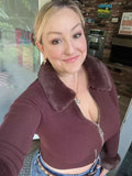 Emily J.